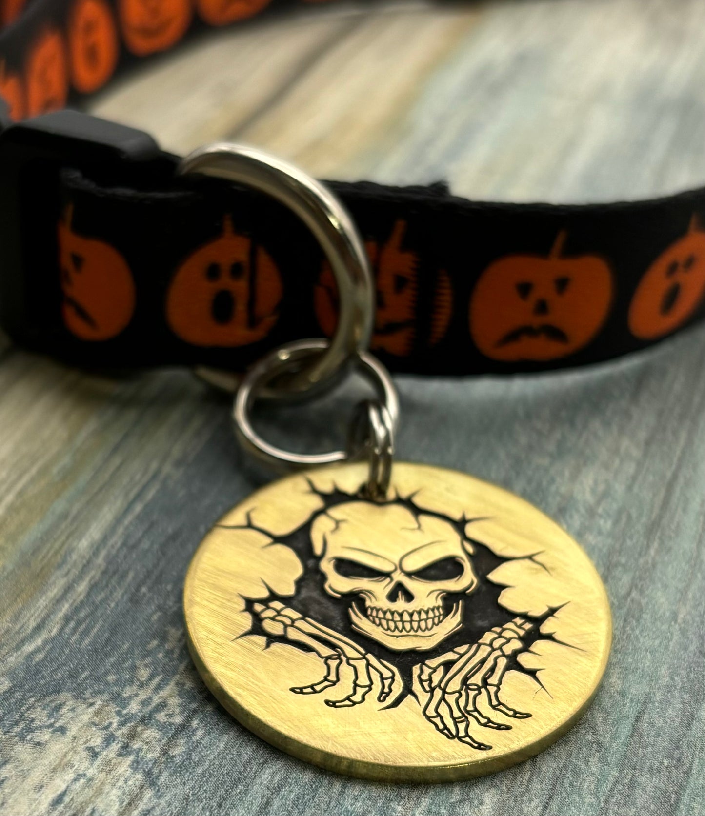 Skull breaking through wall pet id tag